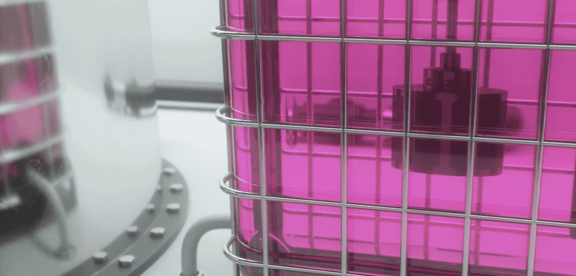 Close-up of SpinChem process reactor with circulating pink liquid, demonstrating intensified mixing and solid-liquid processing technology.