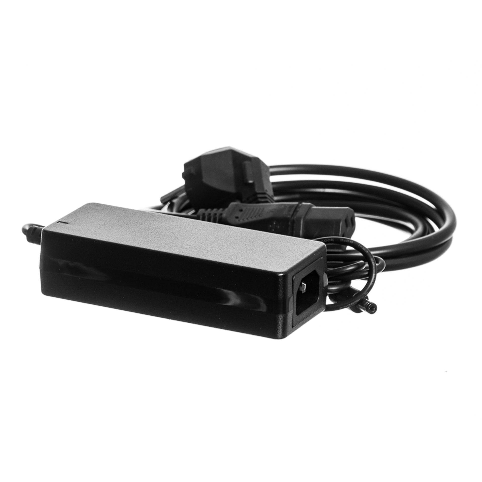 power supply unit for SpinChem laboratory equipment featuring a compact design with integrated power cable and DC connector